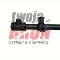 Luneta Meopta ZD 6-24x56 RD z widocznym białym napisem modelu na tubusie i wieżyczkami balistycznymi na tle znaku wodnego.