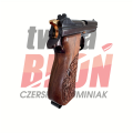 Pistolet Sig Sauer P210 125 Jahre - widok pod kątem, zbliżenie na kurek i bezpiecznik