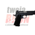 Pistolet Sig Sauer GSR Evolution - zbliżenie na chwyt, spust i bezpiecznik