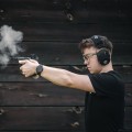 Ochronniki słuchu aktywne RealHunter Active ProSHOT QuadTAC czarne - strzelanie na strzelnicy