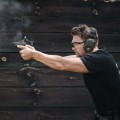 Ochronniki słuchu aktywne RealHunter Active ProSHOT QuadTAC oliwkowe - strzelanie z pistoletu