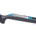 Sztucer Tikka T3x Carbon Raven - zbliżenie na bezpiecznik z niebieskim przyciskiem i zwalniaczem