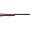 Sztucer Tikka T3x Varmint Hunter LH - zbliżenie na ciężką lufę i drewniane łoże karabinu