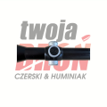 Zbliżenie na bębny wieżyczek regulacyjnych z podziałką na tubusie lunety celowniczej